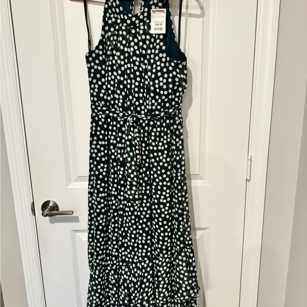 Forest green dress with white polka dots. Matching belt included. New with tags.